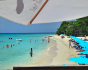West End Water Sports located at Rainbow Beach right next to Rhythms Beach Bar.